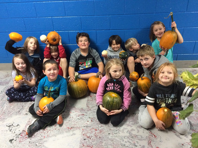 2nd Grade Harvested Pumpkins from our school garden
