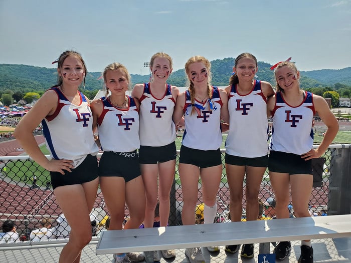 girls posing during state track meet