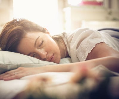 woman sleeping in bed