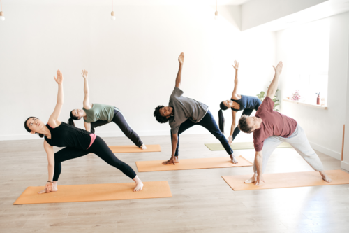 people doing a yoga pose